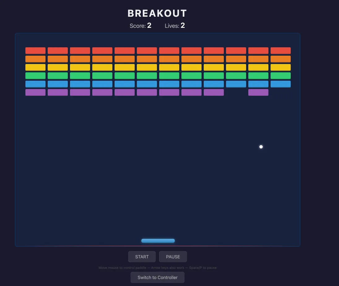 A browser-rendered breakout game with rainbow rows of bricks, a paddle, and a ball mid-flight